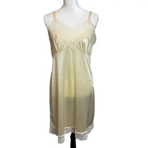 VINTAGE lingerie by Vincent. Ivory color‎ with lace trim.